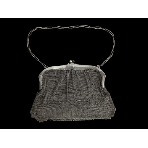 342 - CHARITY - being sold on behalf of Acorn's children's hospice. A silver mesh evening bag with fringe ... 