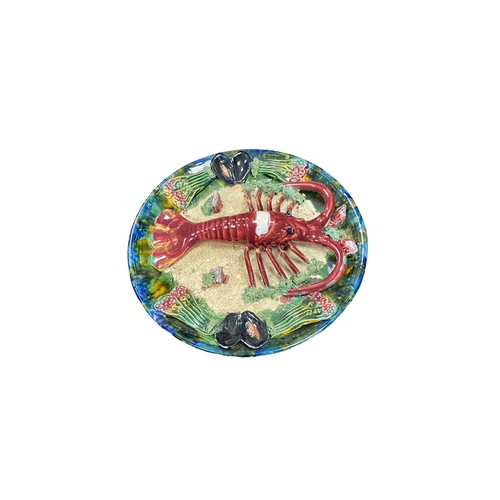 38 - Two Majolica dishes - a crab and a lobster. Approx. 32cm in diameter.