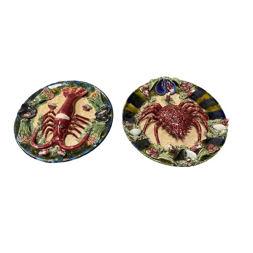 38 - Two Majolica dishes - a crab and a lobster. Approx. 32cm in diameter.