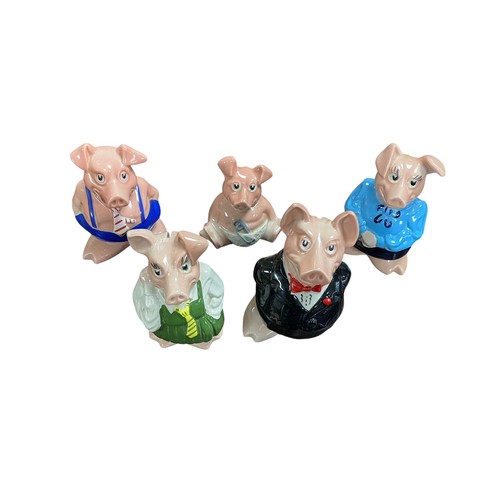 39 - Five Wade Natwest pigs, comprising mother, father, daughter, son, and baby, each with stopper.