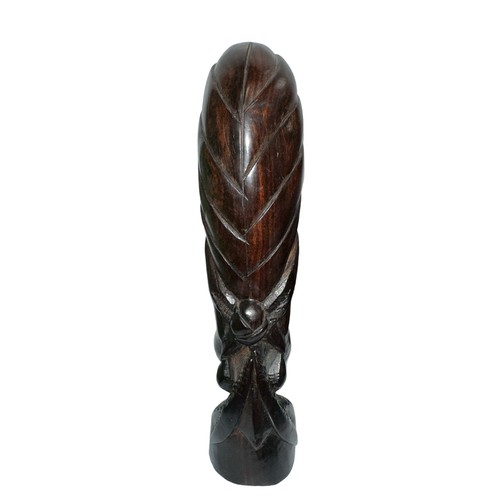 279 - A standing African carved wooden sculpture in the shape of a woman’s head with a phallic design and ... 