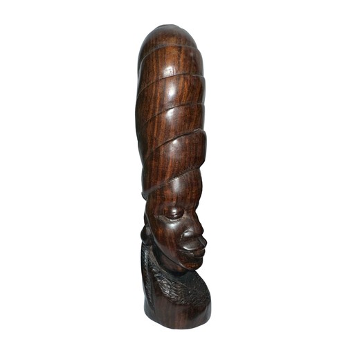 279 - A standing African carved wooden sculpture in the shape of a woman’s head with a phallic design and ... 