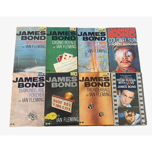 704 - FLEMMING, IAN. ‘James Bond’ A selection of fourteen James Bond Pan Books to include; Casino Royale, ... 