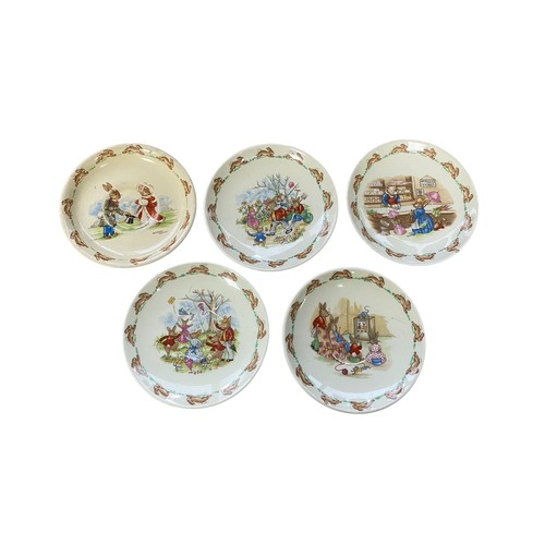 112 - Royal Doulton Bunnykins Childs Dinner Service to include two-handled cups (4), mugs (4, 3 are damage... 