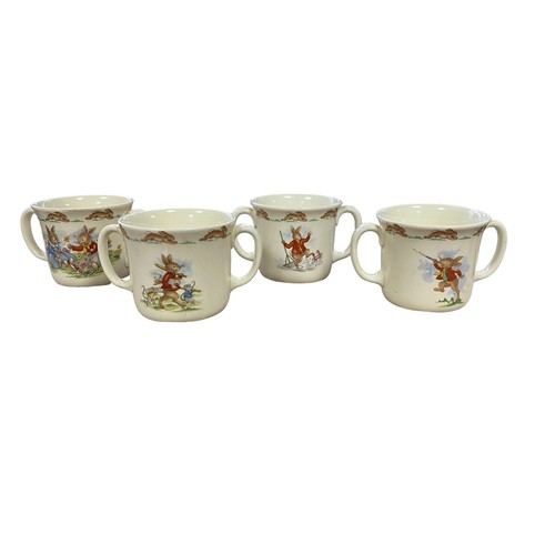 112 - Royal Doulton Bunnykins Childs Dinner Service to include two-handled cups (4), mugs (4, 3 are damage... 