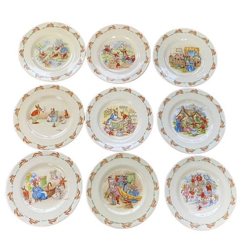 112 - Royal Doulton Bunnykins Childs Dinner Service to include two-handled cups (4), mugs (4, 3 are damage... 