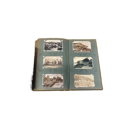 673 - Collection of postcards in three old albums, mainly printed but some RP's, small foreign selection, ... 