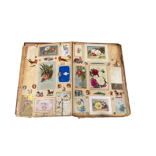 728 - Victorian scrap book with 70+ pages of colour cut-outs, greetings cards etc, significant foxing, fro... 