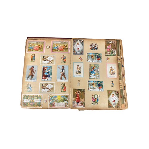 728 - Victorian scrap book with 70+ pages of colour cut-outs, greetings cards etc, significant foxing, fro... 