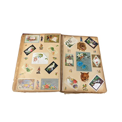 728 - Victorian scrap book with 70+ pages of colour cut-outs, greetings cards etc, significant foxing, fro... 