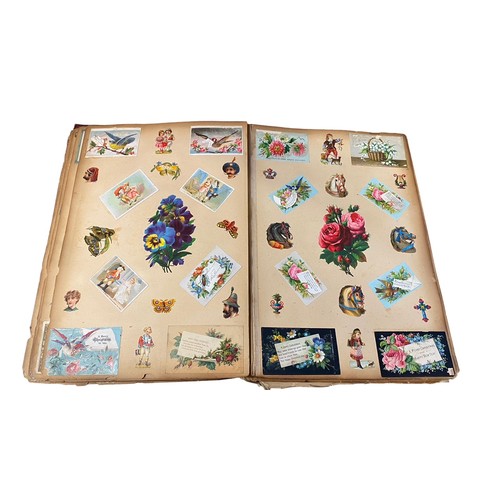 728 - Victorian scrap book with 70+ pages of colour cut-outs, greetings cards etc, significant foxing, fro... 