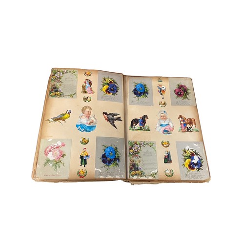 728 - Victorian scrap book with 70+ pages of colour cut-outs, greetings cards etc, significant foxing, fro... 