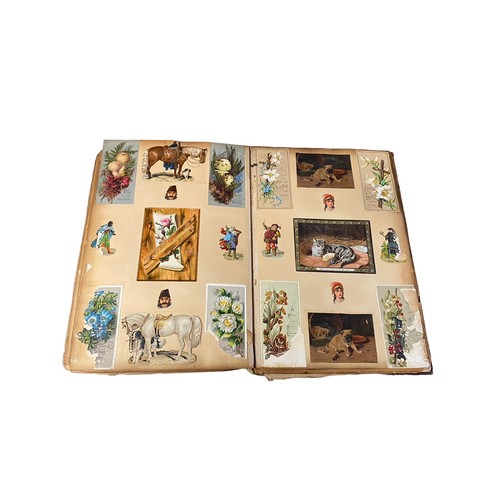 728 - Victorian scrap book with 70+ pages of colour cut-outs, greetings cards etc, significant foxing, fro... 