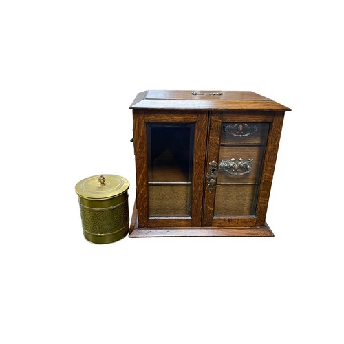 258 - Smokers cabinet with two bevelled glass doors, three internal drawers with brass drop handles, brass... 