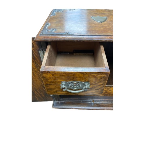 259 - Smokers cabinet with two doors to front, three internal drawers with drop handles, pipe rack, shield... 