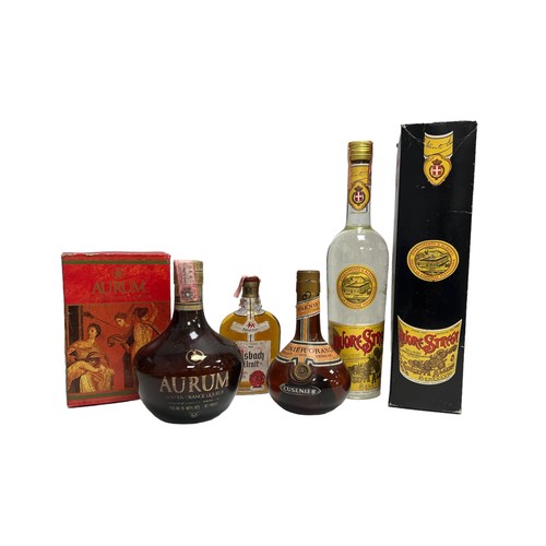 95 - Four bottles of liqueur to include Cusenier 70° proof orange liqueur (12 fl. oz.), Asbach Uralt Bran... 