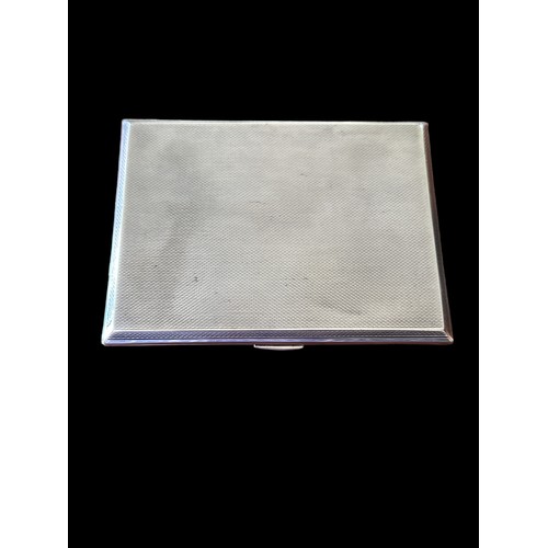 327 - A silver cigarette case with engine turned pattern, Birmingham hallmarks for 1920. Approx 98g. 11.3c... 