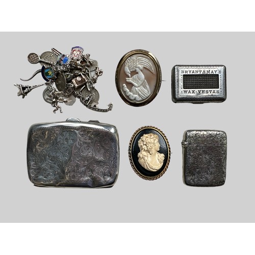 493 - A range of items including a hallmarked silver card case (badly dented), a charm bracelet, 2 cameo b... 