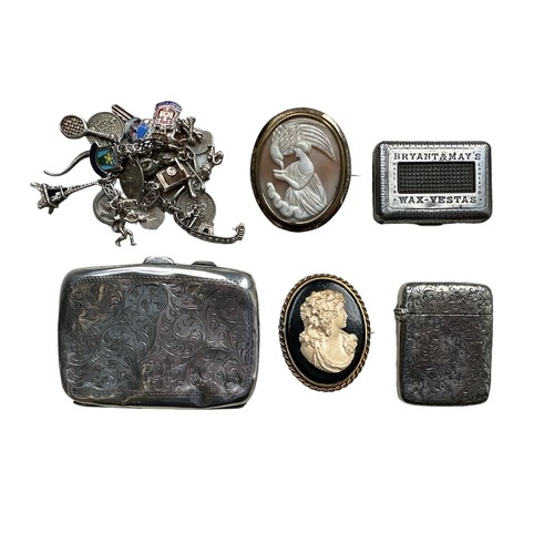 493 - A range of items including a hallmarked silver card case (badly dented), a charm bracelet, 2 cameo b... 