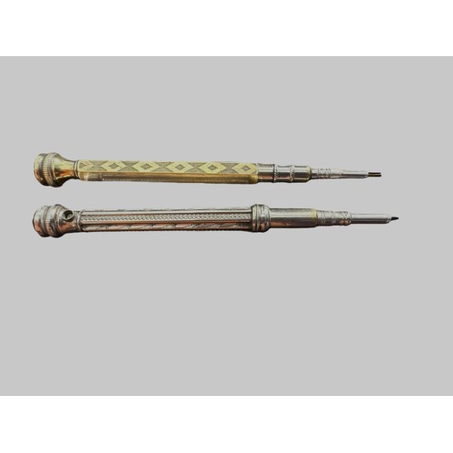 494 - Two propelling pencils with paste seals.