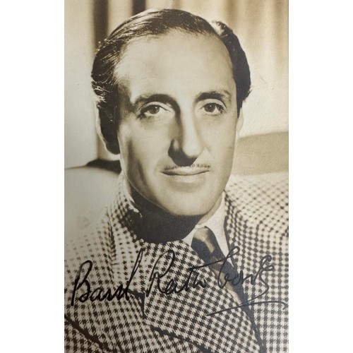 549 - Basil Rathbone (1892-1967) – A framed black and white photograph signed by Basil Rathbone in black i... 