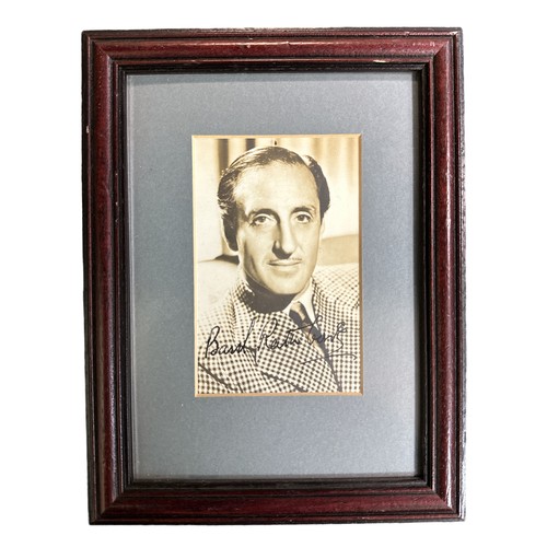 549 - Basil Rathbone (1892-1967) – A framed black and white photograph signed by Basil Rathbone in black i... 