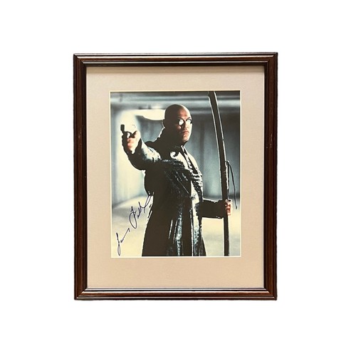 556 - The Matrix – Pair of framed signed photographs of characters from The Matrix to include; a colour ph... 