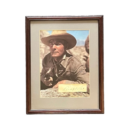 559 - Randolph Scott (1898-1987) – Pair of framed photographs signed by Randolph Scott to include; a black... 