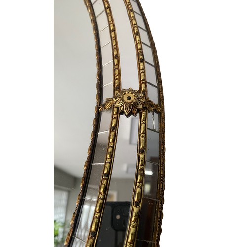 477 - Oval mirror with mirrored mosaic border, 78cm x 59cm.