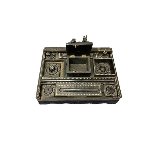 372 - An Eastern ebonised desk/ink stand.