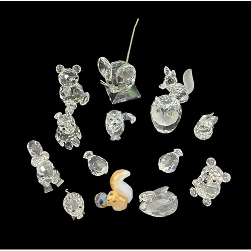 234 - A number of Swarovski crystal animal figures including from In the Summer Meadow series, Sitting Mou... 