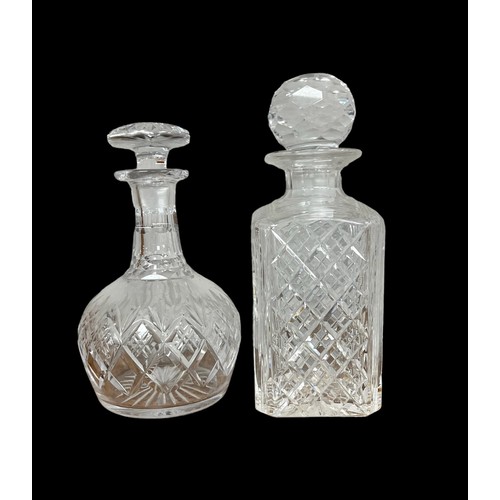 301 - Range of glass decanters (2) 23cm and 26cm tall, and vases (5) from 17cm to 36cm. Qty 7 items