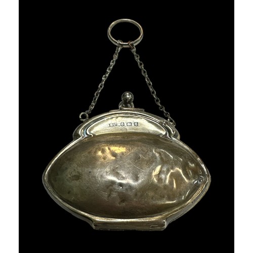 223 - A hallmarked silver coin purse, with interlocking ball ended clip, and ring pull carry handle.