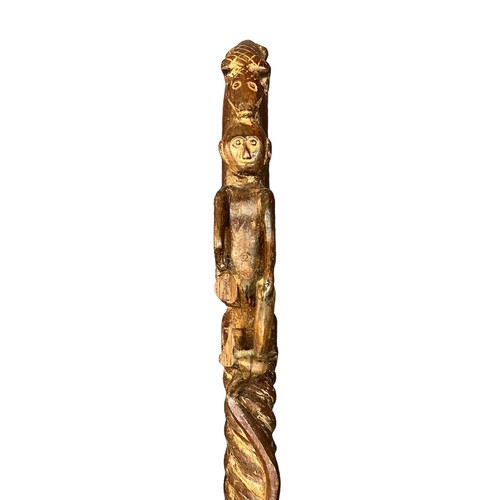 305 - Collection of twelve walking sticks, several with interesting carvings including an owl, African ani... 