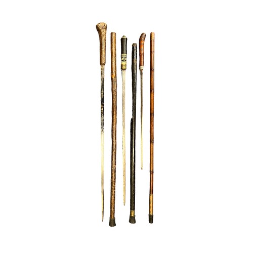 308 - Three sword / dagger sticks, one bamboo with 42cm blade and total length 92cm, dark wood with brass ... 