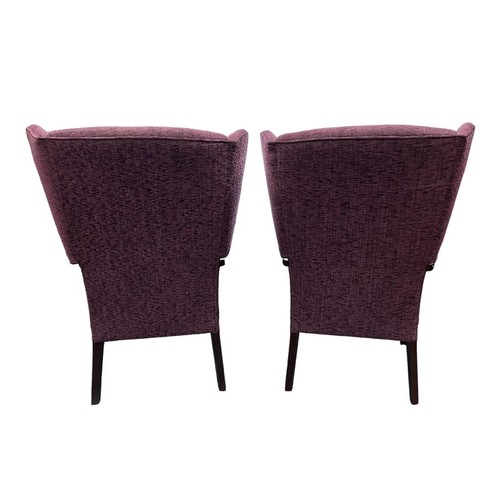 268 - A pair of mid 20th Century Parker Knoll arm chairs, recently reupholstered, width 64cm, depth 84cm, ... 