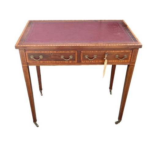 497 - Edwardian mahogany 2 drawer writing table, brass casters, width 76cm, depth 47cm, height 74cm.