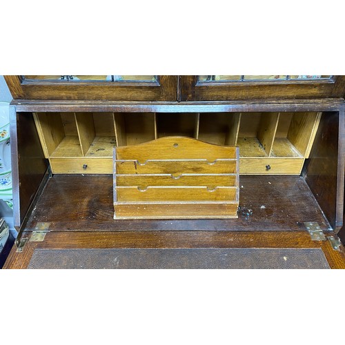 454 - Early 20th Century leaded bureau bookcase, height 206cm, width 90cm, depth 46cm.