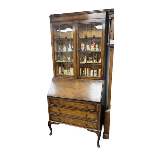 454 - Early 20th Century leaded bureau bookcase, height 206cm, width 90cm, depth 46cm.