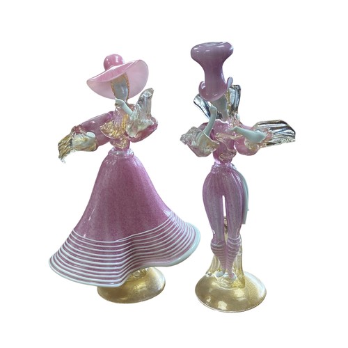 301A - A pair of  Italian pink Murano Glass dancing figurines, on hollow rounded bases with gilt details. H... 