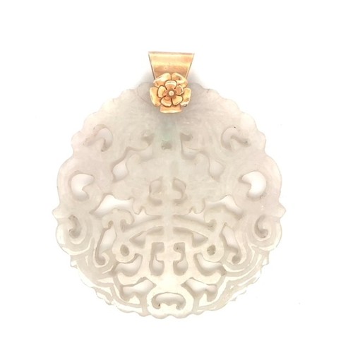 454 - A Chinese carved openwork jade pendant with character and foliate decoration and 9ct gold mount with... 