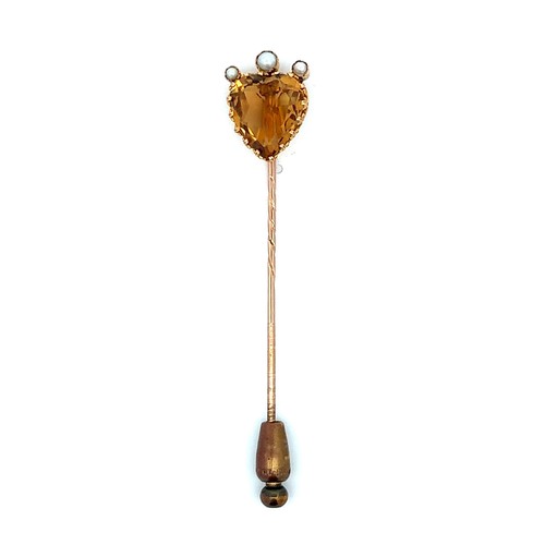 476 - An unmarked gold citrine and split pearl pin, length 75mm. Citrine is heart shaped, in good conditio... 