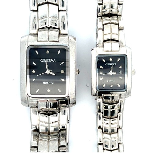 565 - Geneva His & Hers stainless steel watches in case. Quartz movement. Gents style J2491. Ladies style ... 