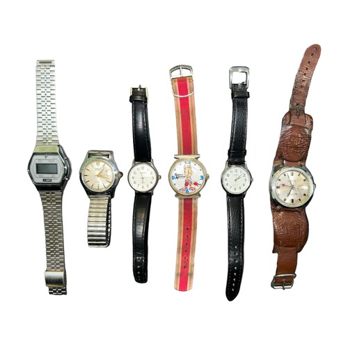 611 - A selection of six various watches, to include; a Spiro Agnew political character D.T.C watch in box... 