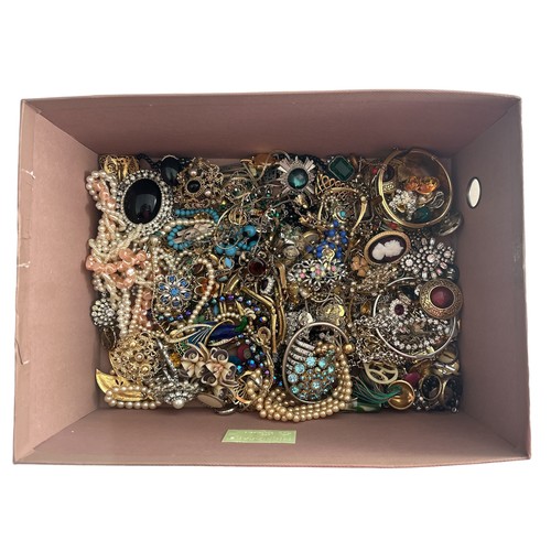 511 - A box of costume jewellery. Some sold AF.