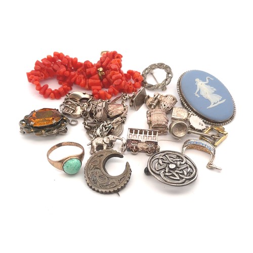 505 - A number of silver jewellery items including a charm bracelet,  crescent moon brooch.  Also a coral ... 