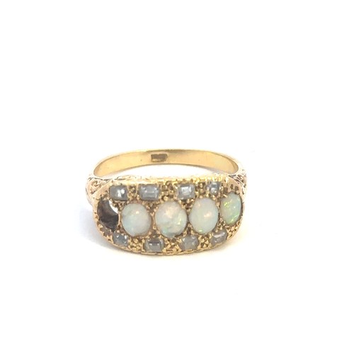 516 - An opal and diamond ring stamped 18ct, size P. One opal is missing and 2 are chipped. Weight 6.6g ap... 