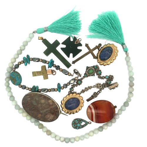 448 - A number of pieces of hardstone jewellery including a nephrite cross pendant with gold mount stamped... 