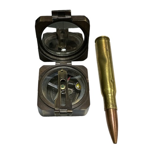 178 - Kelvin & Hughes 1917 brass compass, approx. 5.5 x 5.5 x 3cm when closed, along with bullet case (13.... 