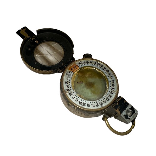 181 - WWII compass, boots & gaiters. Includes T.G. Co. Ltd London MKIII 1943 military compass (some damage... 